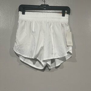 Women's Woven Mid Rise Run Shorts 3”   White.  S